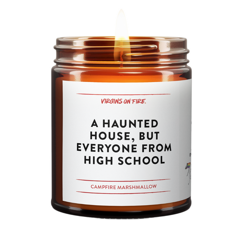 a brown amber jar with lit candle. the text is A Haunted House, But Everyone From High School. Scent is Campfire marshmallow. 
