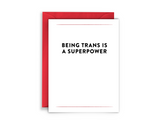 Being Trans is a Superpower Greeting Card. Black font. White background. Red Envelope.