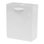 a medium white gift bag for candles. small rope handle. includes tag.