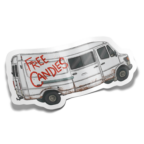 sticker. an old van that says free candles on it.