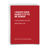 Red greeting card with white envelope. Includes the phrase, "I KNOW HOW HARD IT IS TO BE SOBER. I am so proud of you. Keep going, okay? And call me if you need anything." it is a heartfelt message of sobriety support from virgins on fire candle co.