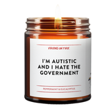 a burning amber candle called, I'm Autistic and I hate the government. peppermint eucalyptus is the scent. it is from virgins on fire candle co.