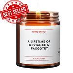 An amber brown jar candle by Virgins On Fire Candle Co. features a white label with "A Lifetime of Deviance & Faggotry" and the scent of Leather & Rose. This candle is handmade in Brooklyn, NY, using 100% soy wax.