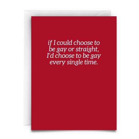 a red greeting card with a white envelope. the card says in white font, "If I could choose to be gay or straight, I'd choose to be gay every single time."