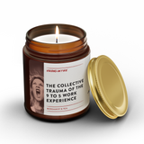 Candle in an amber jar with a label on a white background. The candle is called, "The collective trauma of the 9-5 work experience." It is Bergamot & Tea Scented. Screaming woman photo compliments the candle.