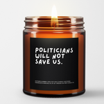A Lit Amber Jar Candle called, "politicians will not save us"