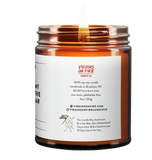 the back of the candle. company info. 100% soy wax. 45-50 hour burn time. made in brooklyn. non-toxic. 9oz. handmade by a gay man.