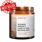 Candle jar with label 'Science doesn't care if you believe in it' and 'Best Seller' stamp on a white background