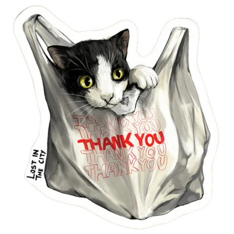 BODEGA CAT BAG STICKER. A black and white cat with yellow eyes in a plastic Thank You bag.