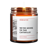 Gin and cypress scented candle 'We're Going to the Catskills!' from gay-owned Brooklyn brand featuring retro-style black and white photo of person in car