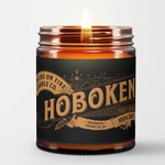 A candle with a vintage style Hoboken label.