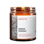 Smoke odor eliminator candle 'Green Sunday' from LGBTQ+ Brooklyn brand 'Virgins on Fire' with cannabis leaf pattern and modern minimalist design