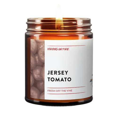 Jersey Tomato Candle from Virgins On Fire Candle Co. brown amber jar. Lit flame. Tomato image on left. 